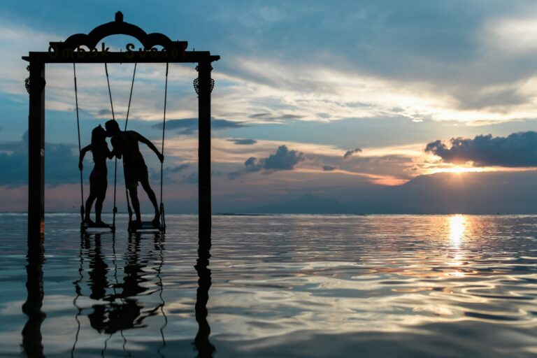 Cute couple kissing in sea