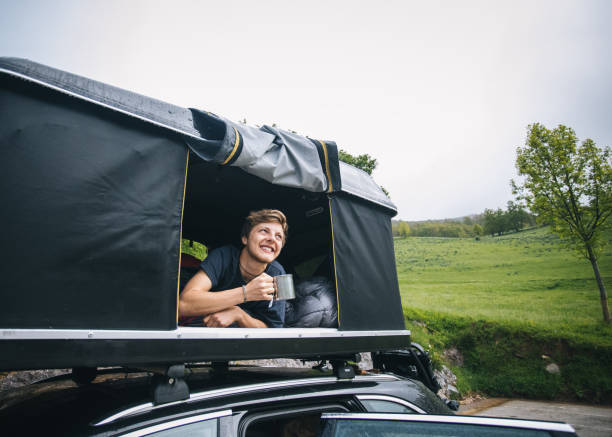 Man on a roof car tent