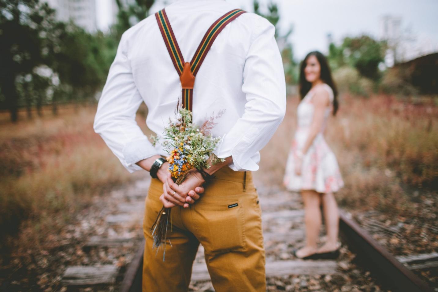Man Holding Flower bouquets in hand