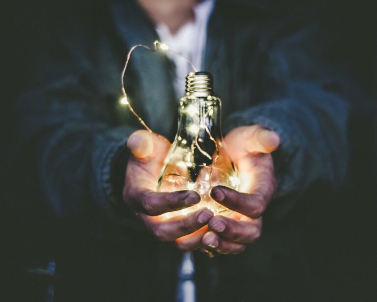 Man holding a bulb