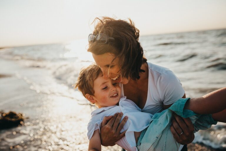 mother with her child on the beach