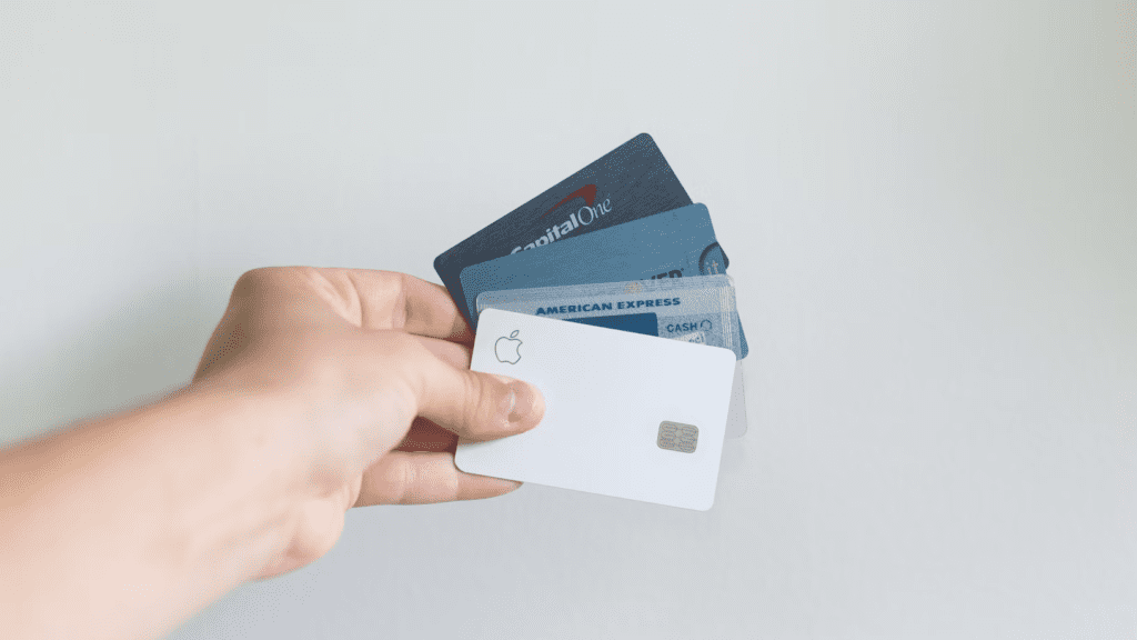 Multiple credit cards in hand