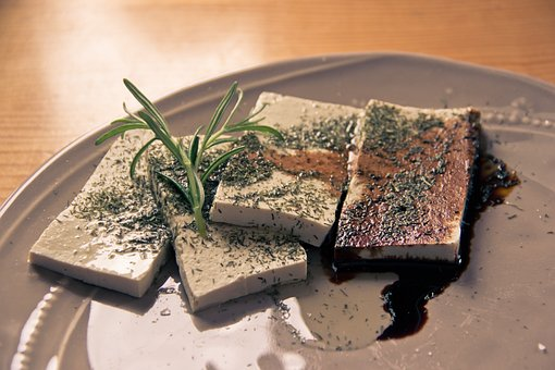 Tofu slices on a plate