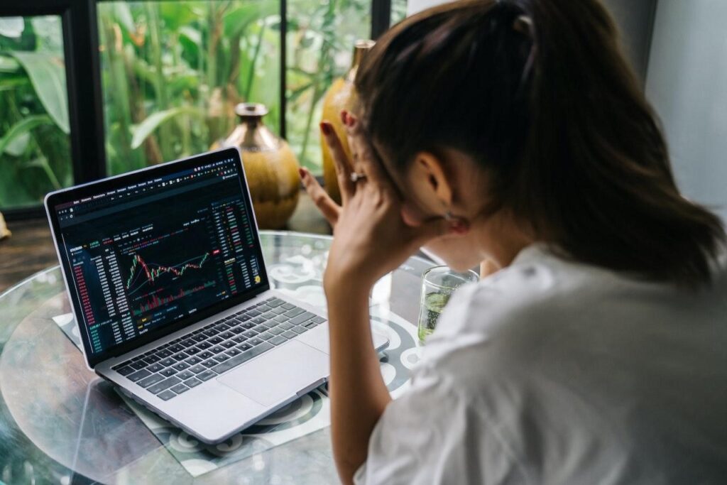 woman analyzing currency charts