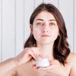 Woman applying Moisturizer For Dry Skin 